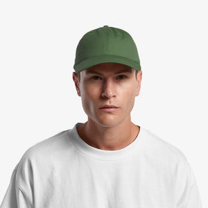 Man wearing AS Colour Access Cap in Cypress - 1130