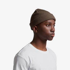Man wearing AS Colour Cable Beanie in Walnut - 1120