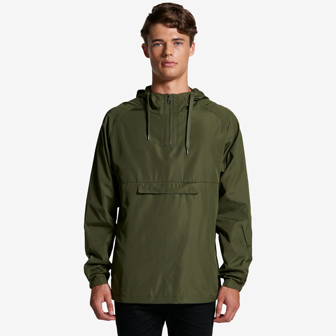 Man wearing AS Colour Men's Cyrus Windbreaker Jacket in Army Front - 5501
