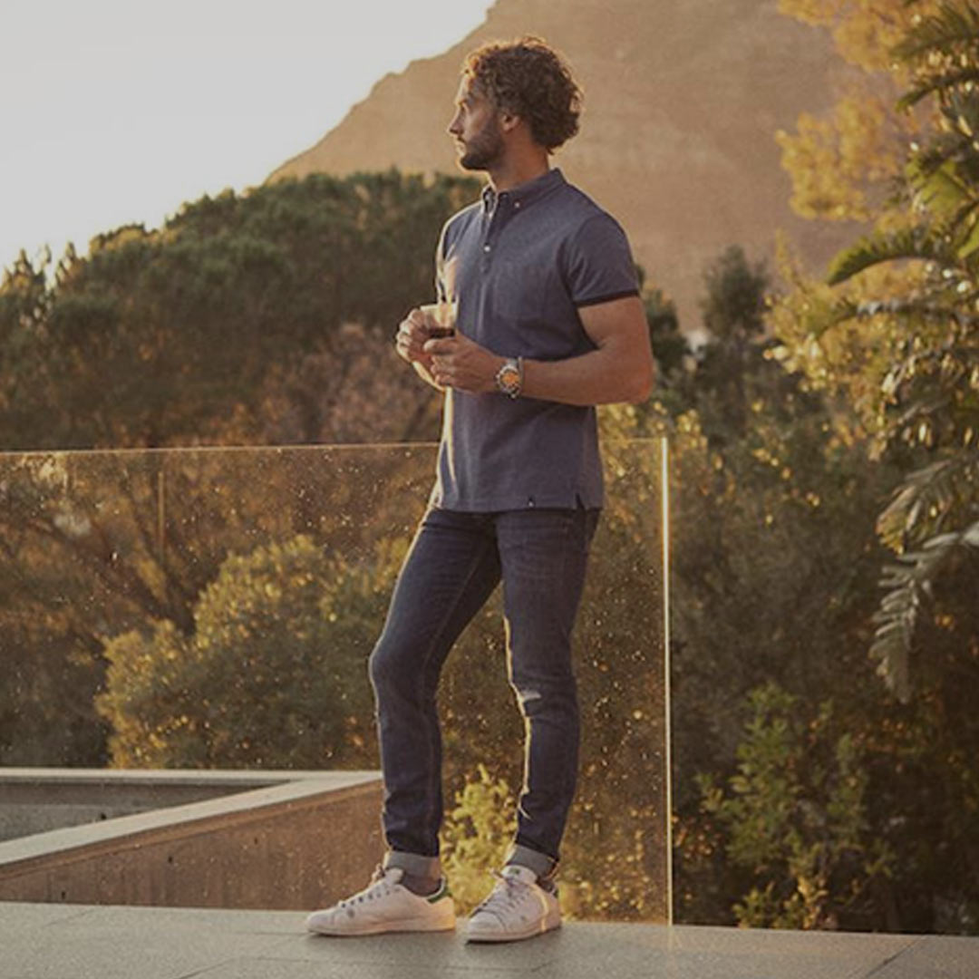 Man wearing James Harvest Larkford Men's Cotton Polo in Dark Blue - JH204S