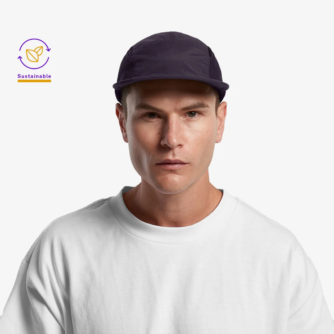 Man wearing AS Colour Finn Active Cap in Navy Front - 1180