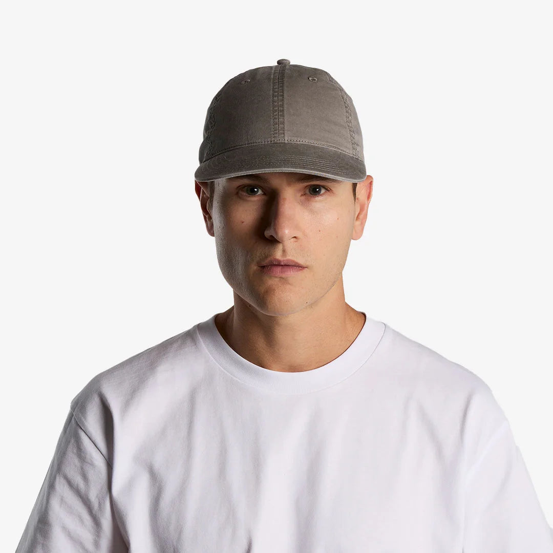 Man wearing AS Colour Access Faded Cap in Faded Grey - 1134