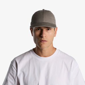 Man wearing AS Colour Access Faded Cap in Faded Grey - 1134