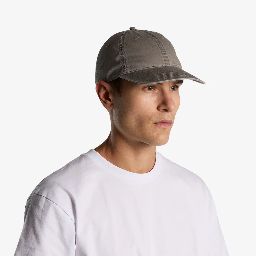 Man wearing AS Colour Access Faded Cap Side in Faded Grey - 1134