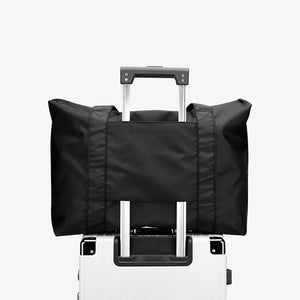 Lifestyle Photo of Little Jim Tote Bag in Black - 241120-7-55