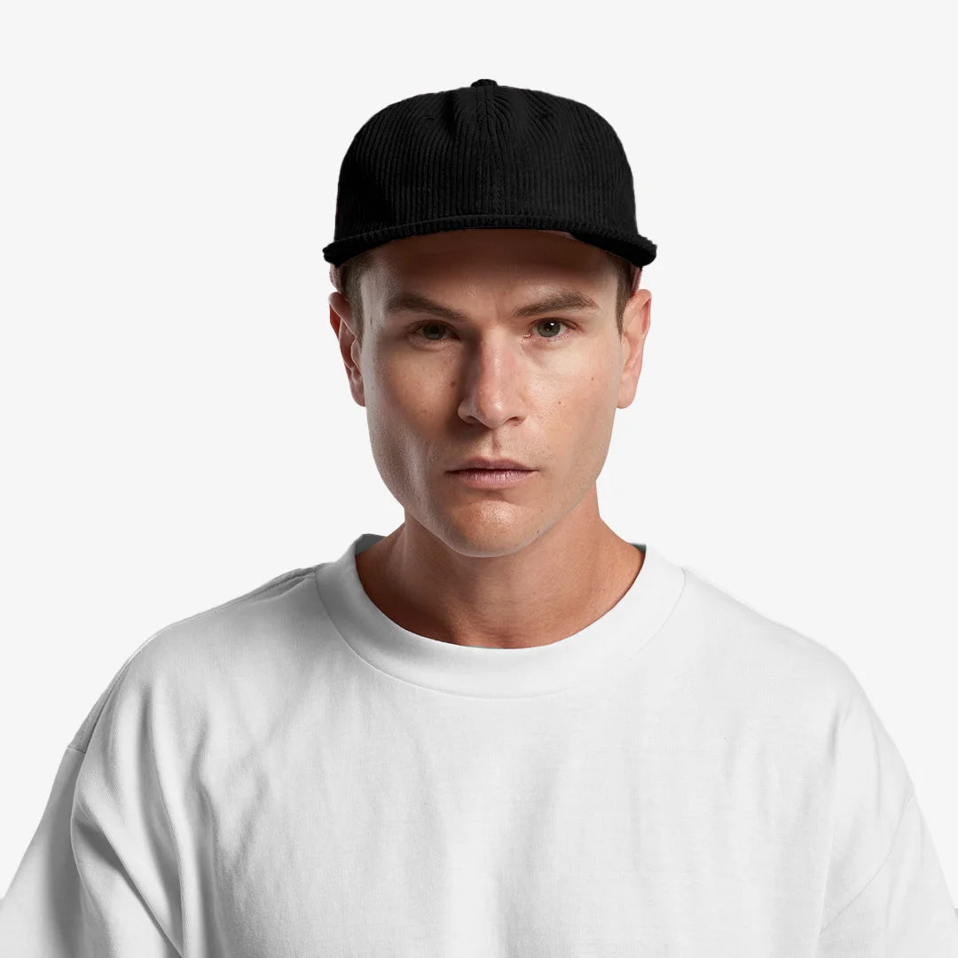Man wearing AS Colour Class Cord Cap - 1152