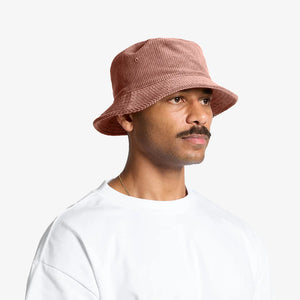 Man wearing AS Colour Cord Bucket Hat in Hazy Pink Side View - 1176
