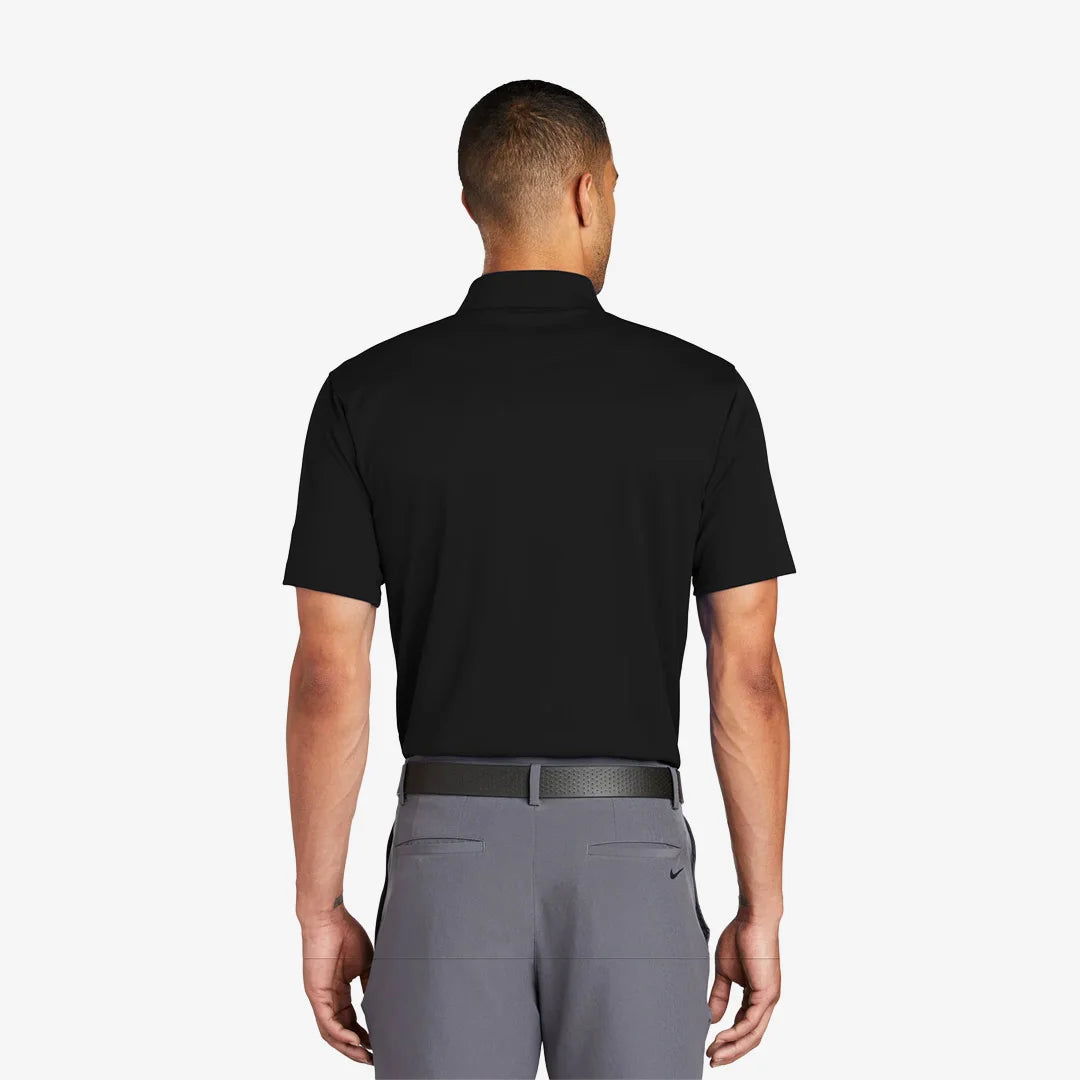 Man wearing Nike Tech Basic Dri-FIT Polo Back in Black - 203690
