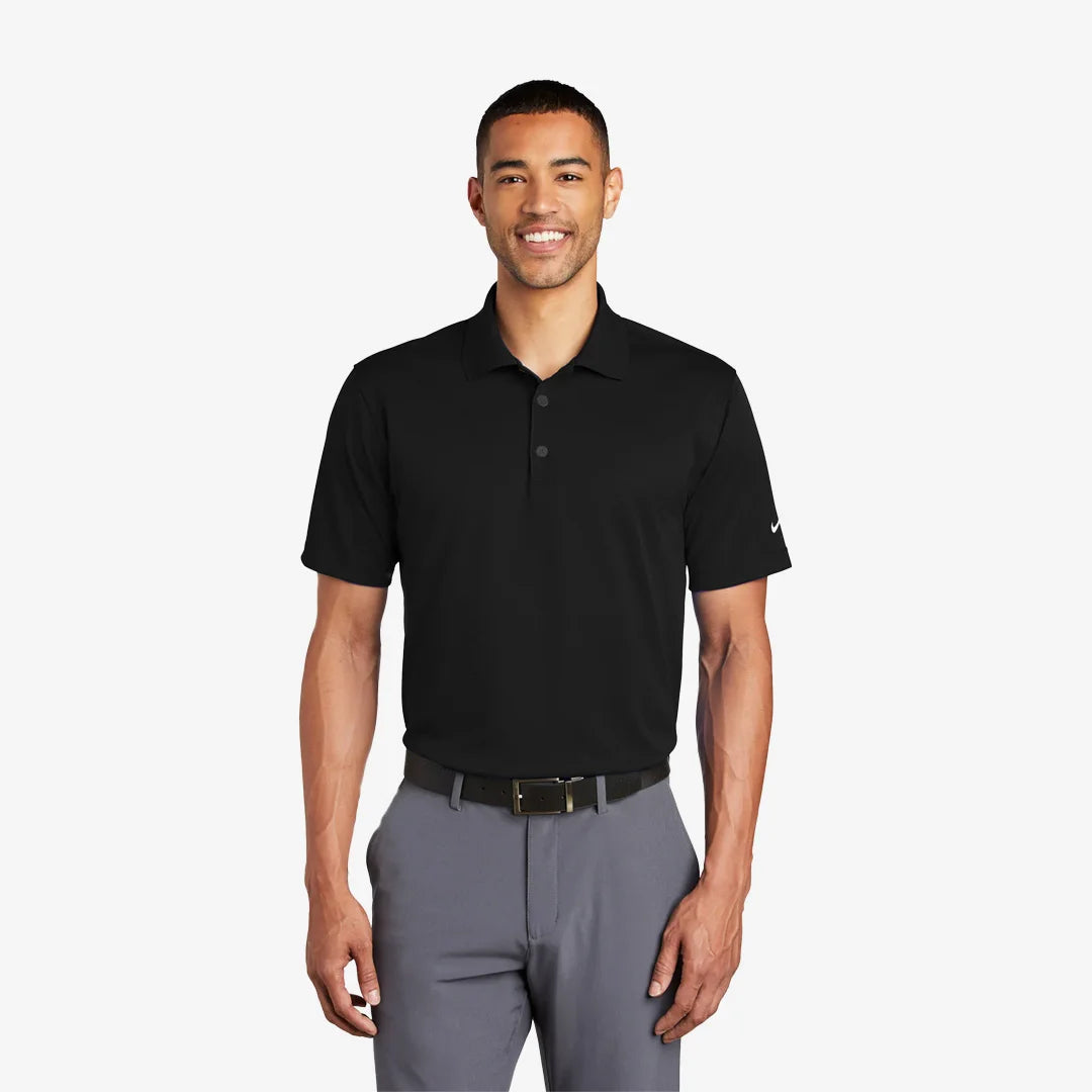 Man wearing Nike Tech Basic Dri-FIT Polo in Black - 203690