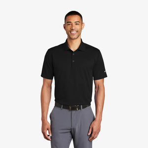 Man wearing Nike Tech Basic Dri-FIT Polo in Black - 203690