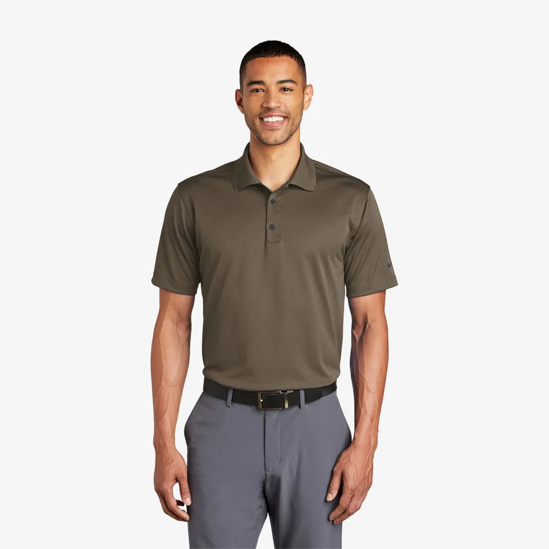 Man wearing Nike Tech Basic Dri-FIT Polo in Olive Khaki - 203690