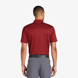 Man wearing Nike Tech Basic Dri-FIT Polo Back in Pro Red - 203690
