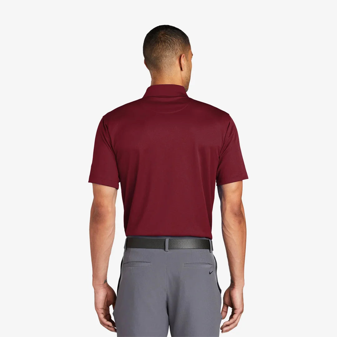 Man wearing Nike Tech Basic Dri-FIT Polo Back in Team Red - 203690
