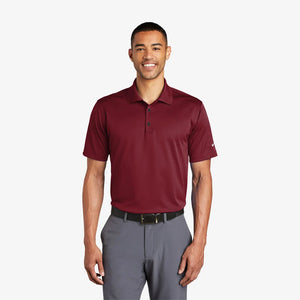 Man wearing Nike Tech Basic Dri-FIT Polo in Team Red - 203690