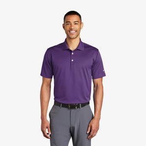 Man wearing Nike Tech Basic Dri-FIT Polo in Varsity Purple - 203690