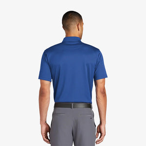 Man wearing Nike Tech Basic Dri-FIT Polo Back in Varsity Royal - 203690