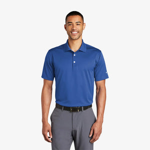 Man wearing Nike Tech Basic Dri-FIT Polo in Varsity Royal - 203690