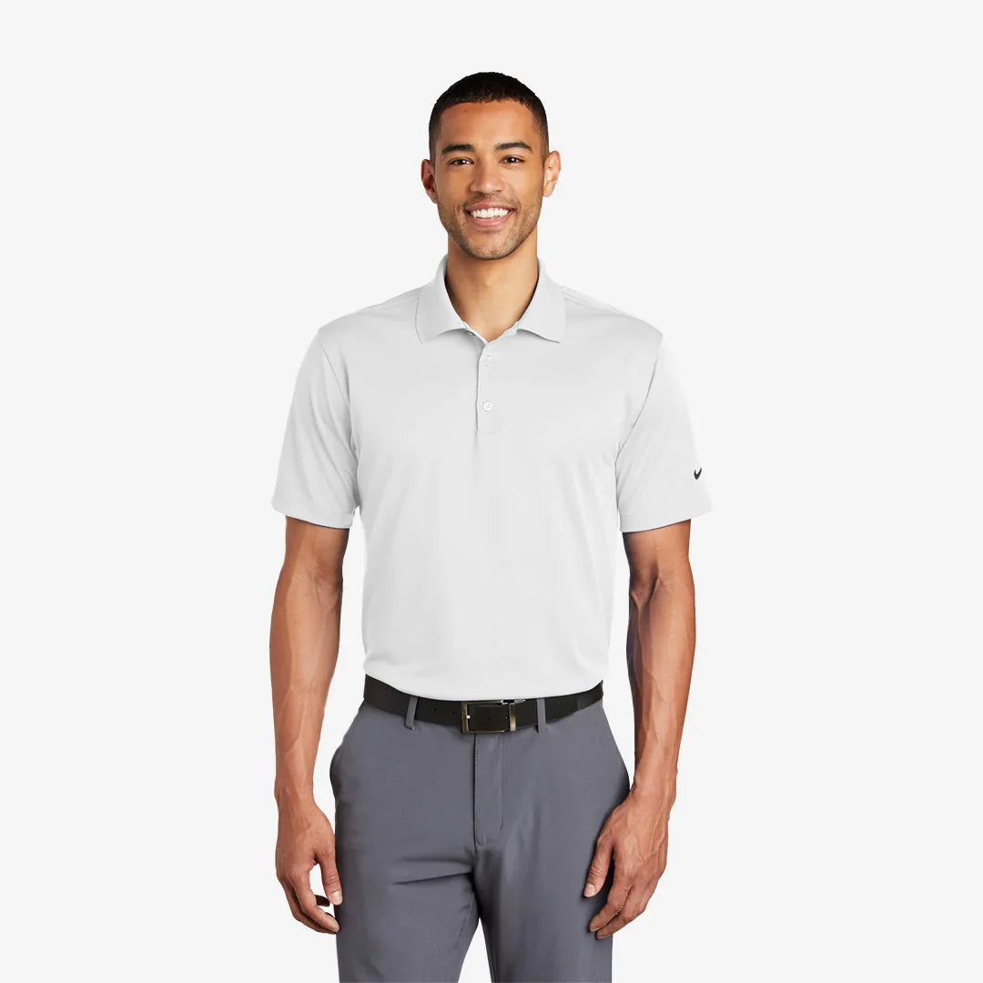 Man wearing Nike Tech Basic Dri-FIT Polo in White - 203690