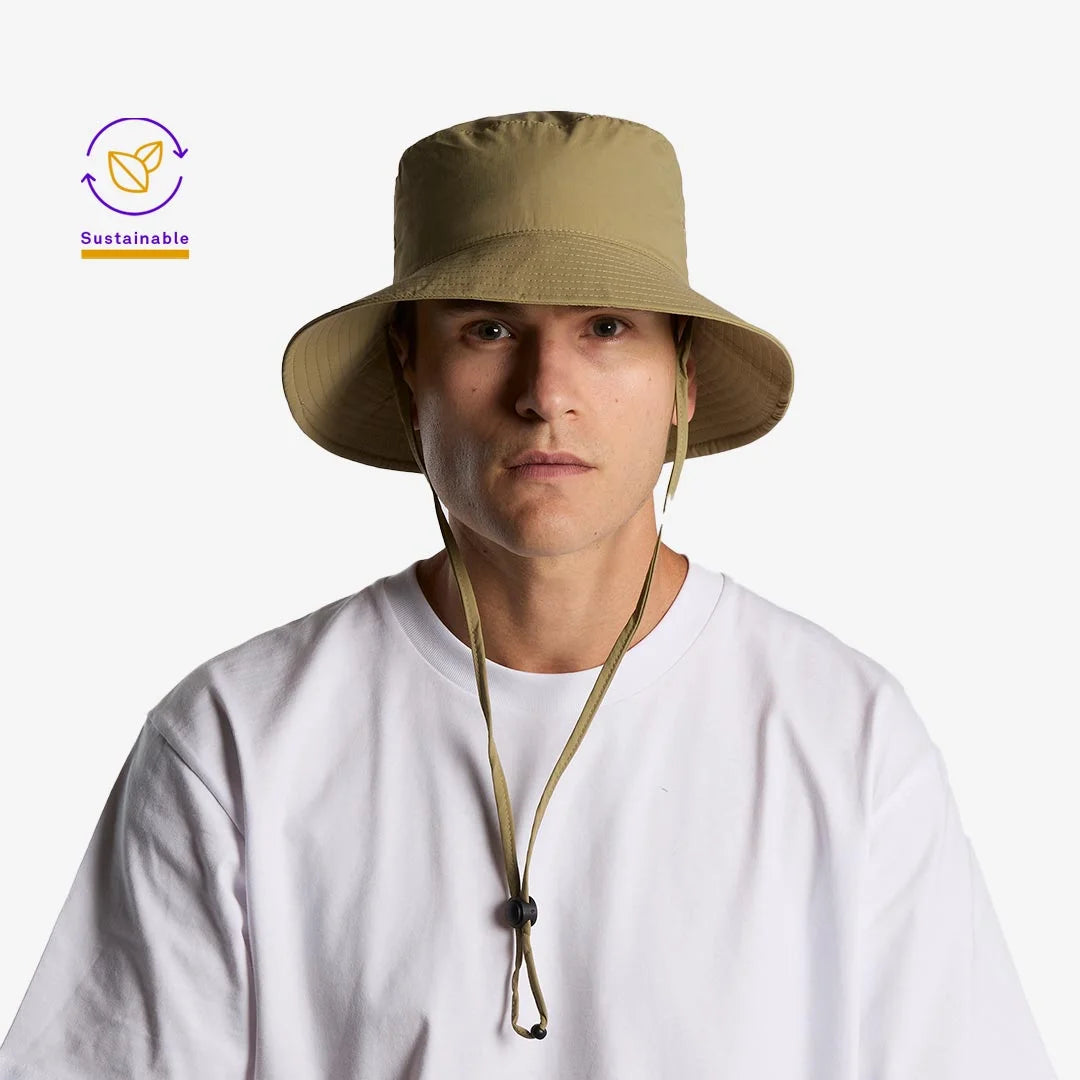Man wearing AS Colour Nylon Wide Brim Bucket Hat in Khaki - 1174