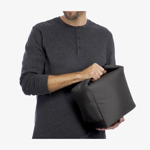 Man holding Legend Life Oasis 12 Pack Cooler - NTX-1 