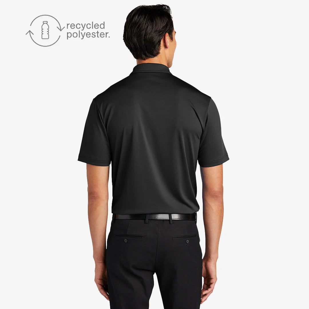 Man wearing Port Authority Men's C-FREE Snag-Proof Polo Shirt in Deep Black Back - K864