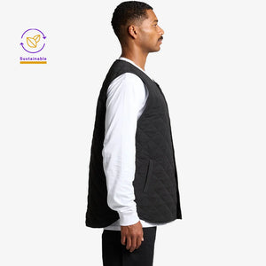 Man wearing AS Colour Quilted Vest Side in Black - 5531