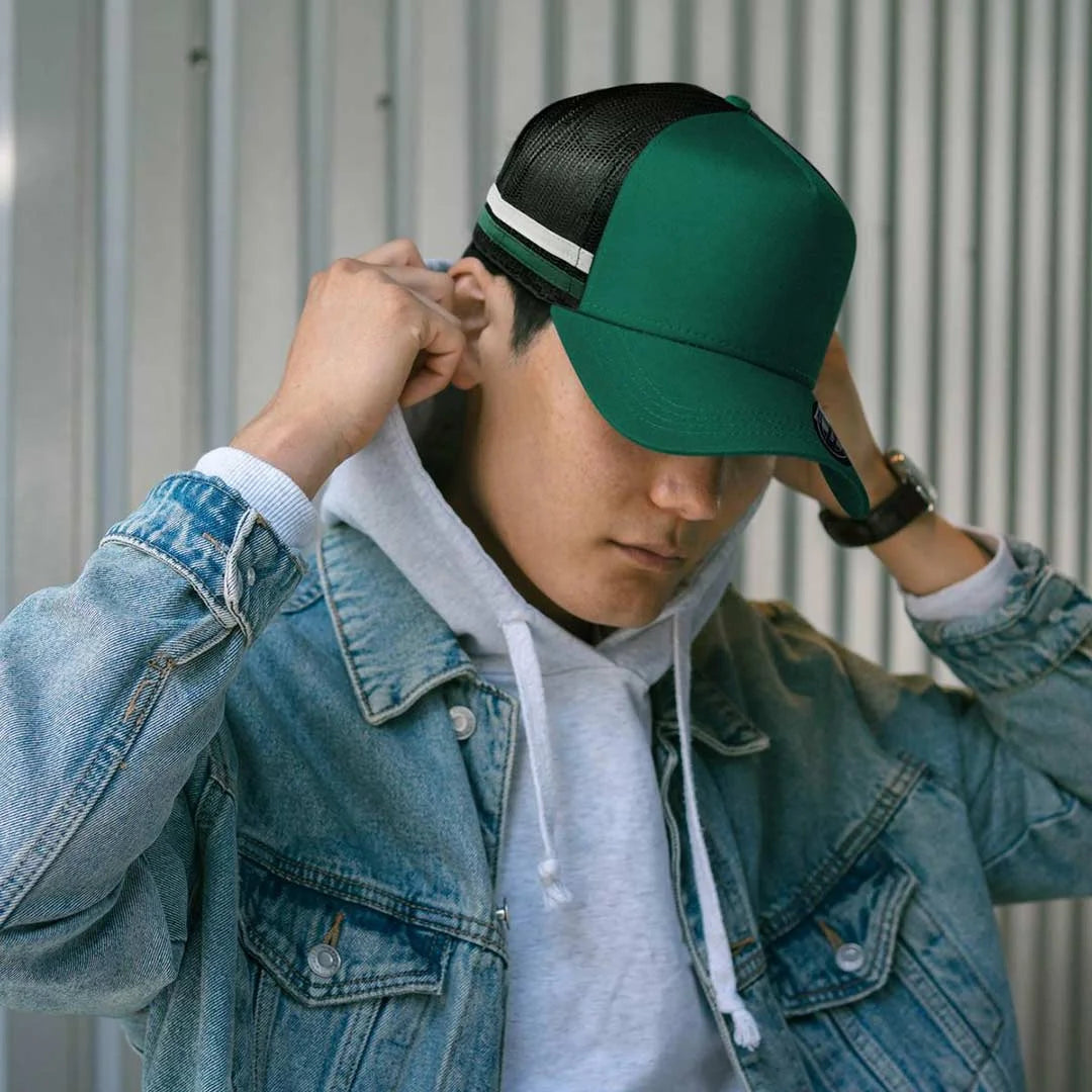Man wearing Legend Life Striped Trucker Cap - 7050