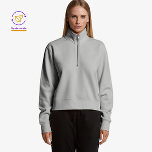 Woman wearing AS Colour Women’s Stencil Half Zip Fleece Pullover in Grey Marle Front Angle - 4125