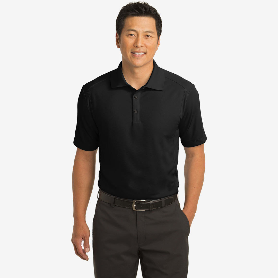 Man wearing Nike Men's Dri-FIT Classic Polo in Black Front - 267020