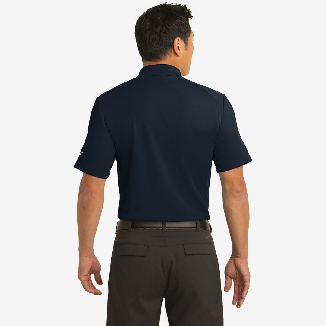 Man wearing Nike Men's Dri-FIT Classic Polo in Midnight Navy Back - 267020