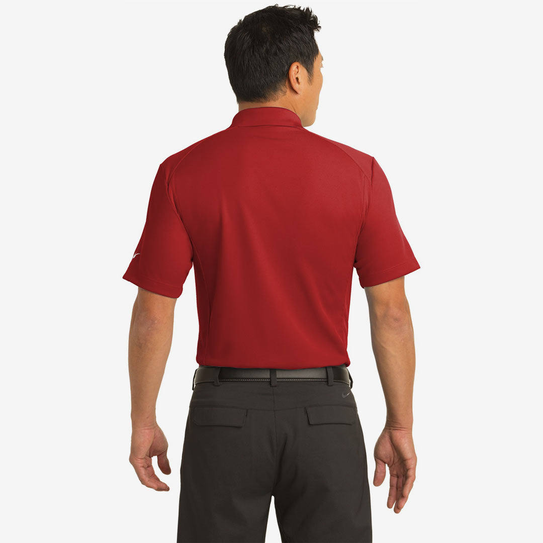 Man wearing Nike Men's Dri-FIT Classic Polo in Varity Red Back - 267020