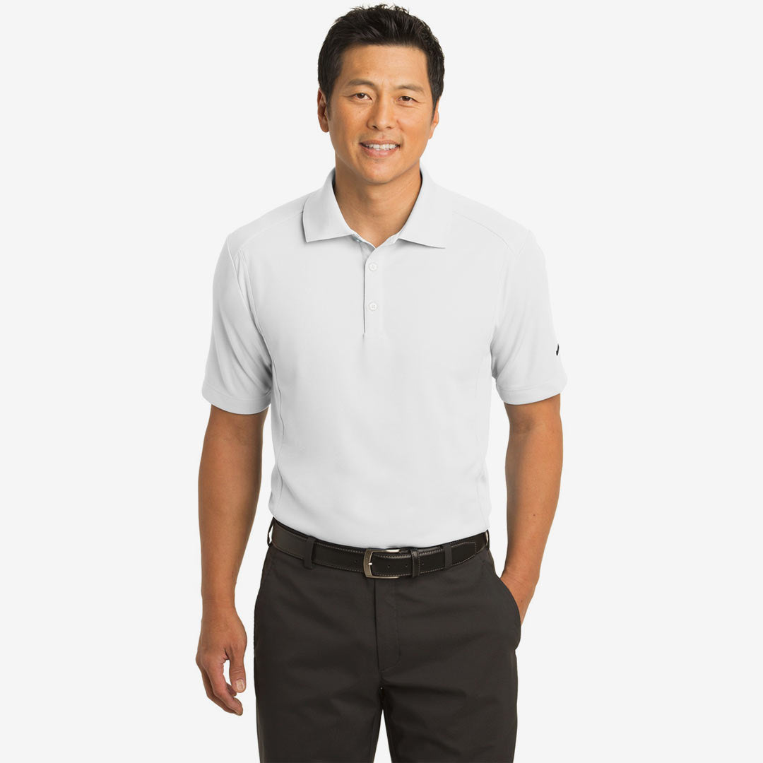 Man wearing Nike Men's Dri-FIT Classic Polo in White Front - 267020