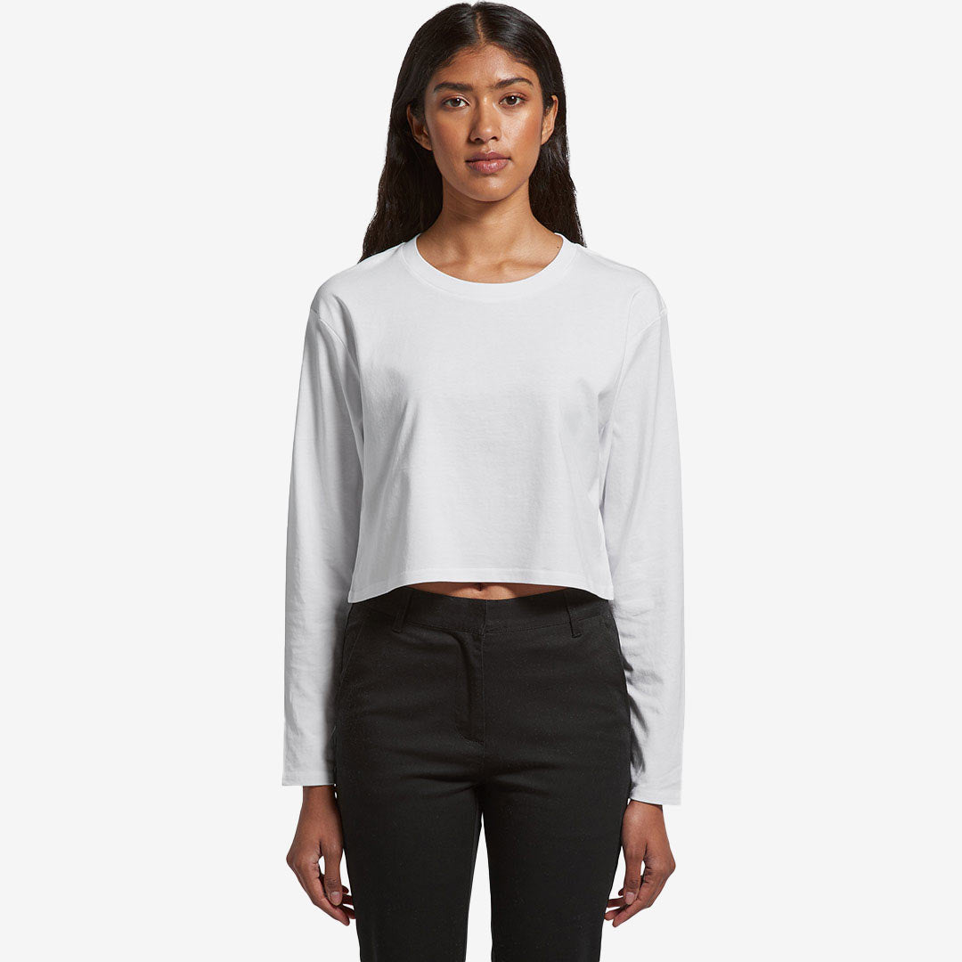 Woman wearing AS Colour Women's Crop Long Sleeve Tee in White Front - 4058