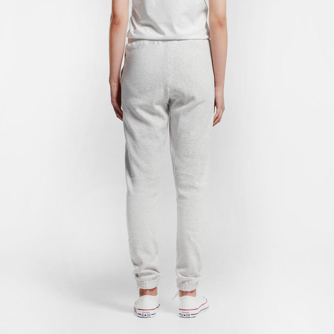 Woman wearing AS Colour Women's Surplus Track Pant in White Marle Back - 4067