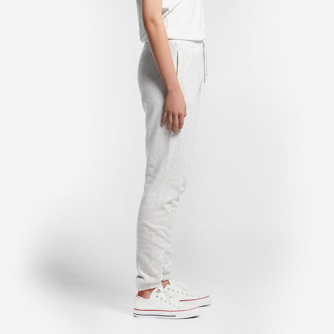 Woman wearing AS Colour Women's Surplus Track Pant in White Marle Side - 4067