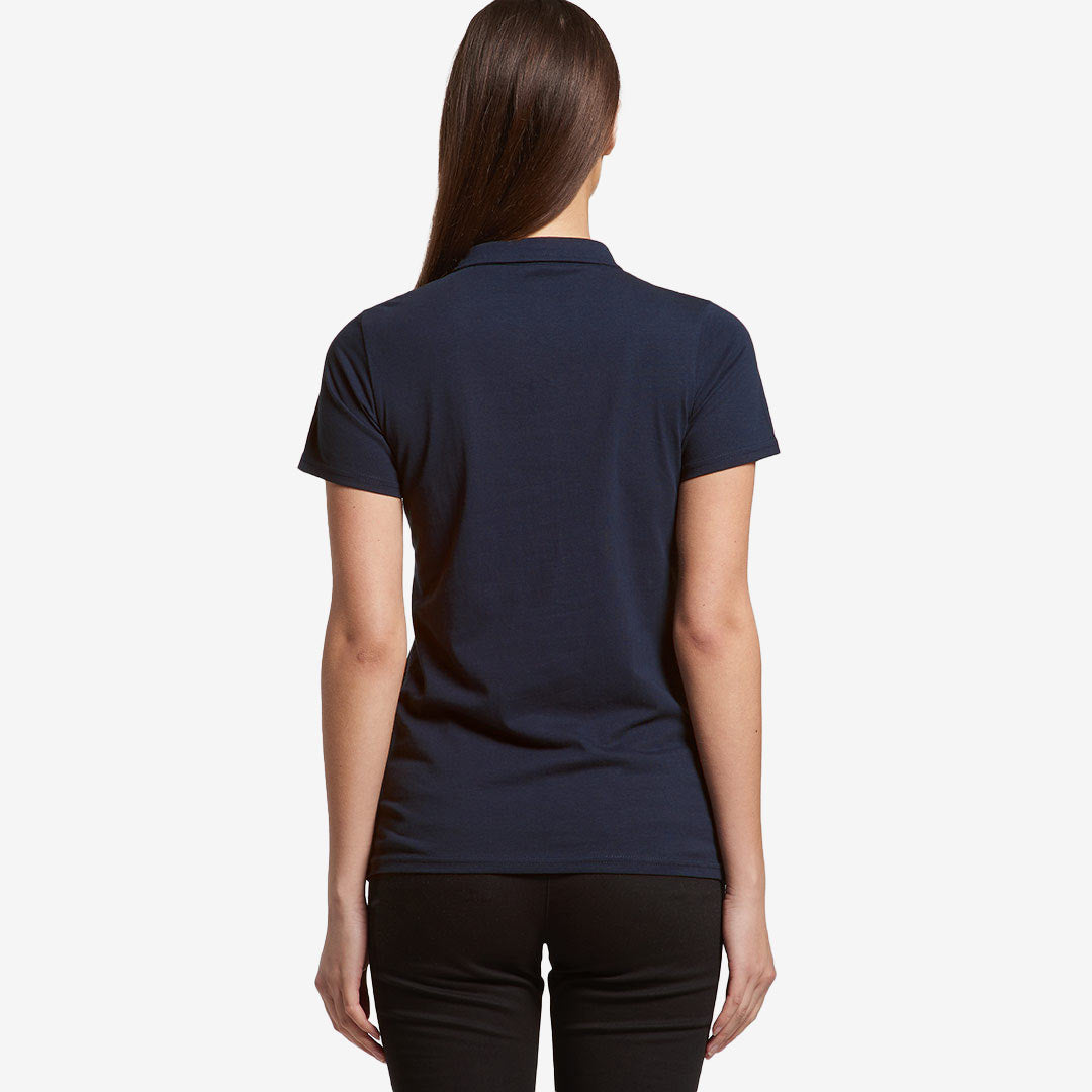 Woman wearing AS Colour Women's Amy Polo Shirt in Navy Back - 4402