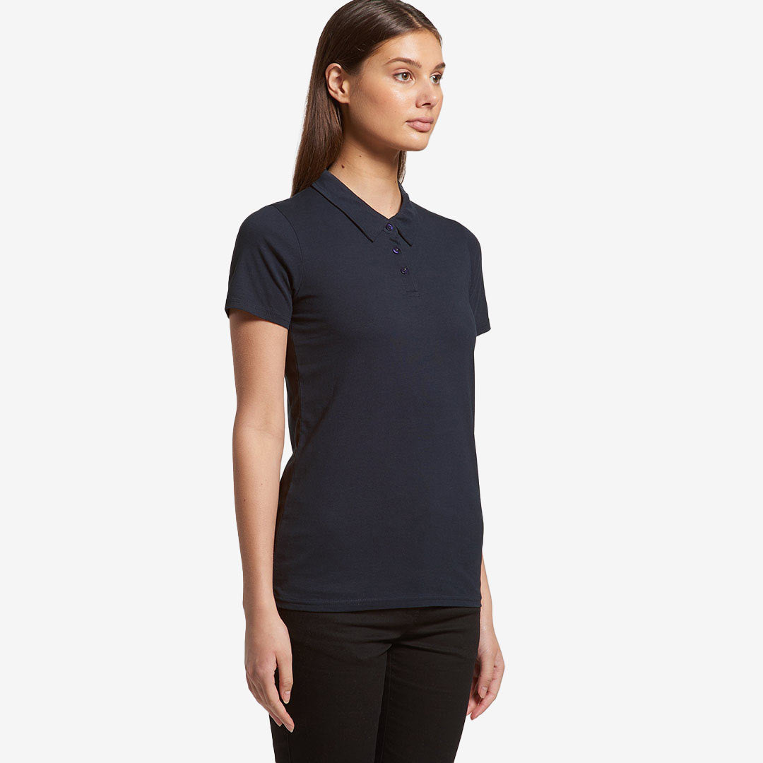 Woman wearing AS Colour Women's Amy Polo Shirt in Navy Right Side - 4402