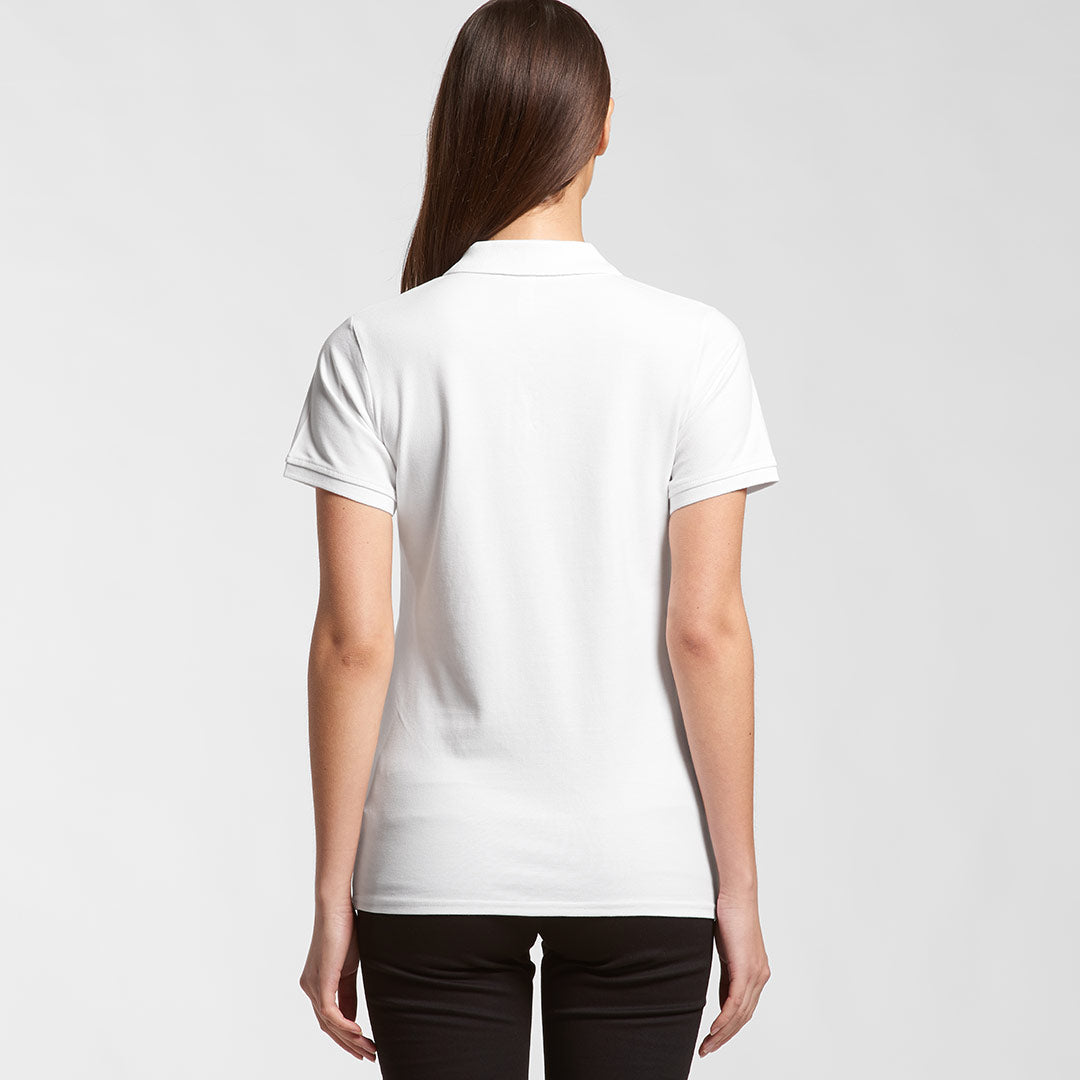 Woman wearing AS Colour Women's Pique Polo Shirt in White Back - 4411