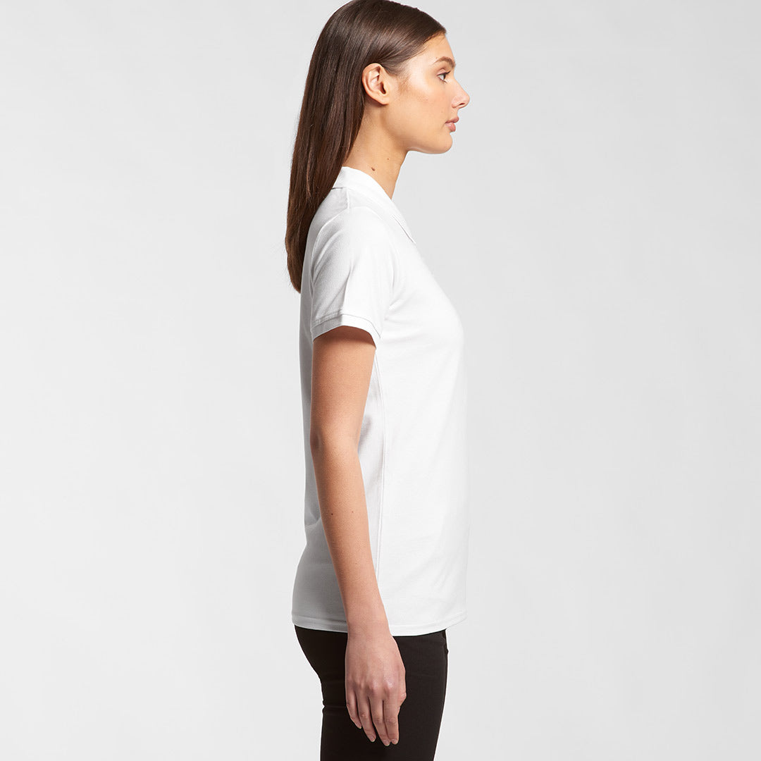 Woman wearing AS Colour Women's Pique Polo Shirt in White Righthand Side - 4411