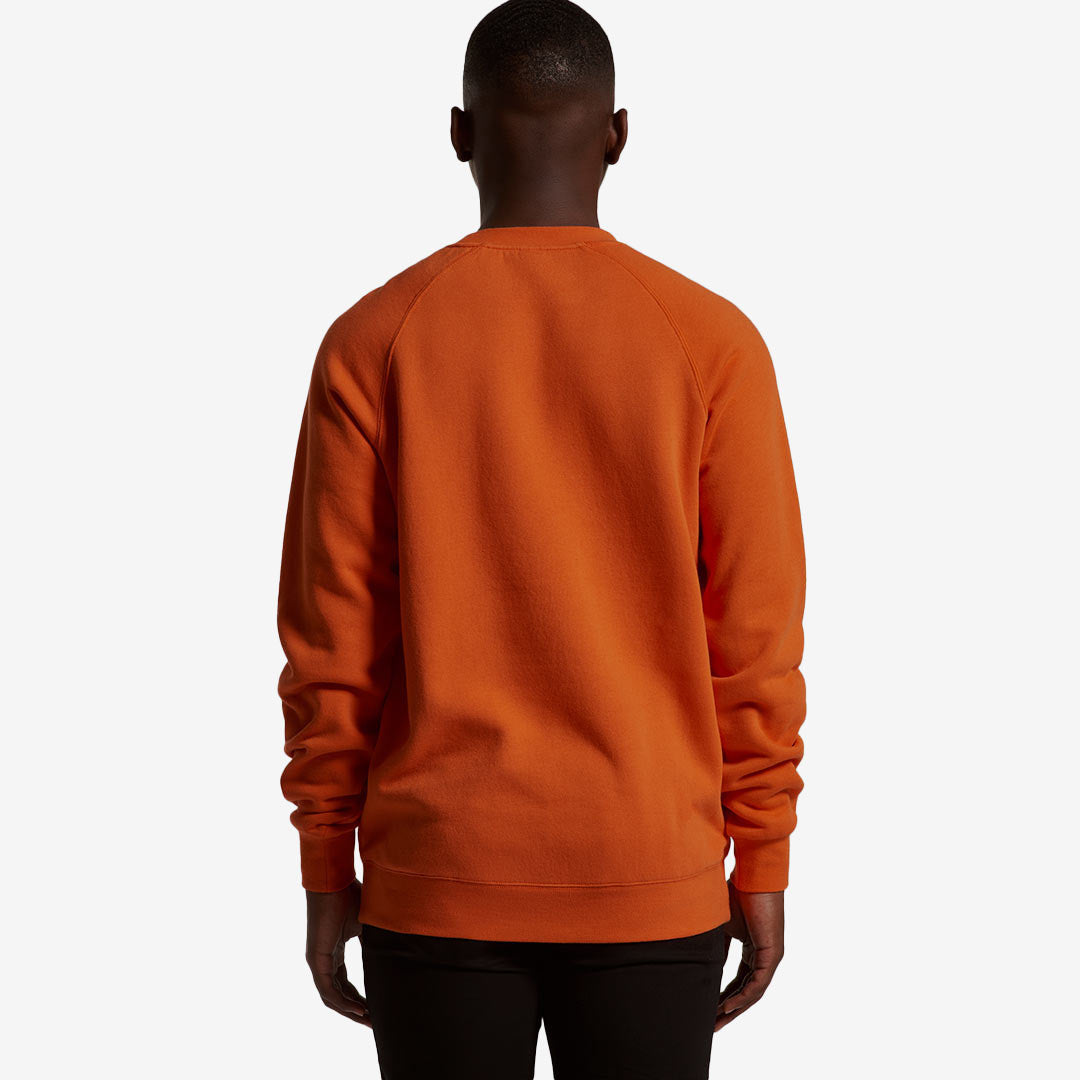 Man wearing AS Colour Men's Supply Crew Sweatshirt in Orange Back - 5100