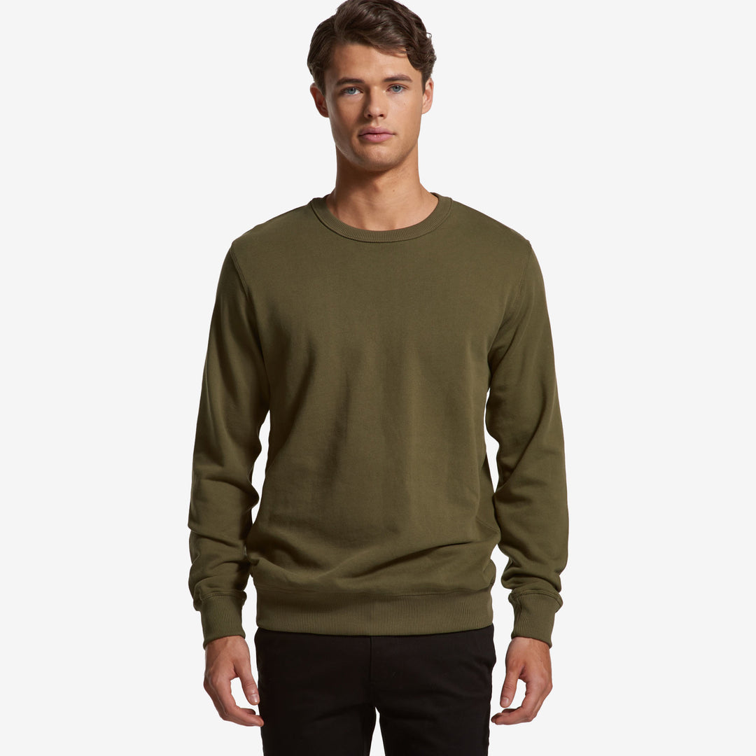 Man wearing AS Colour Men's Premium Crew Sweatshirt in Army Front - 5121