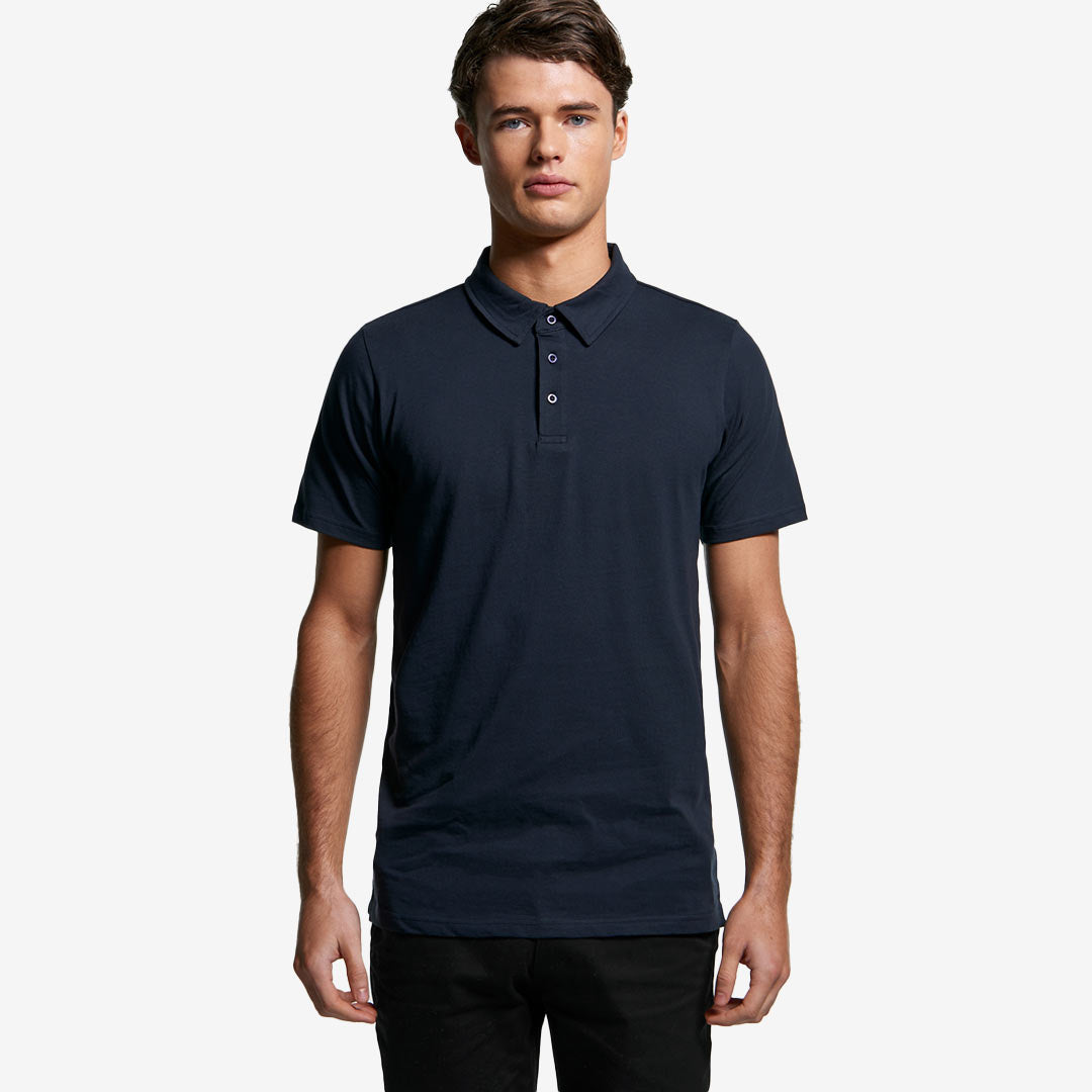 Man wearing AS Colour Men's Chad Polo in Navy Front - 5402
