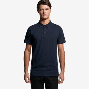 Man wearing AS Colour Men&
