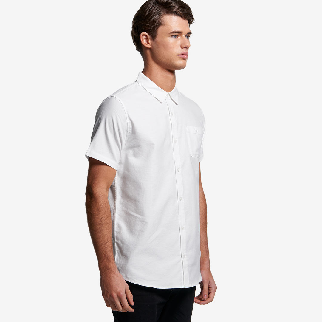 Man wearing AS Colour Men's Oxford Short Sleeve Shirt in White Right Side - 5407