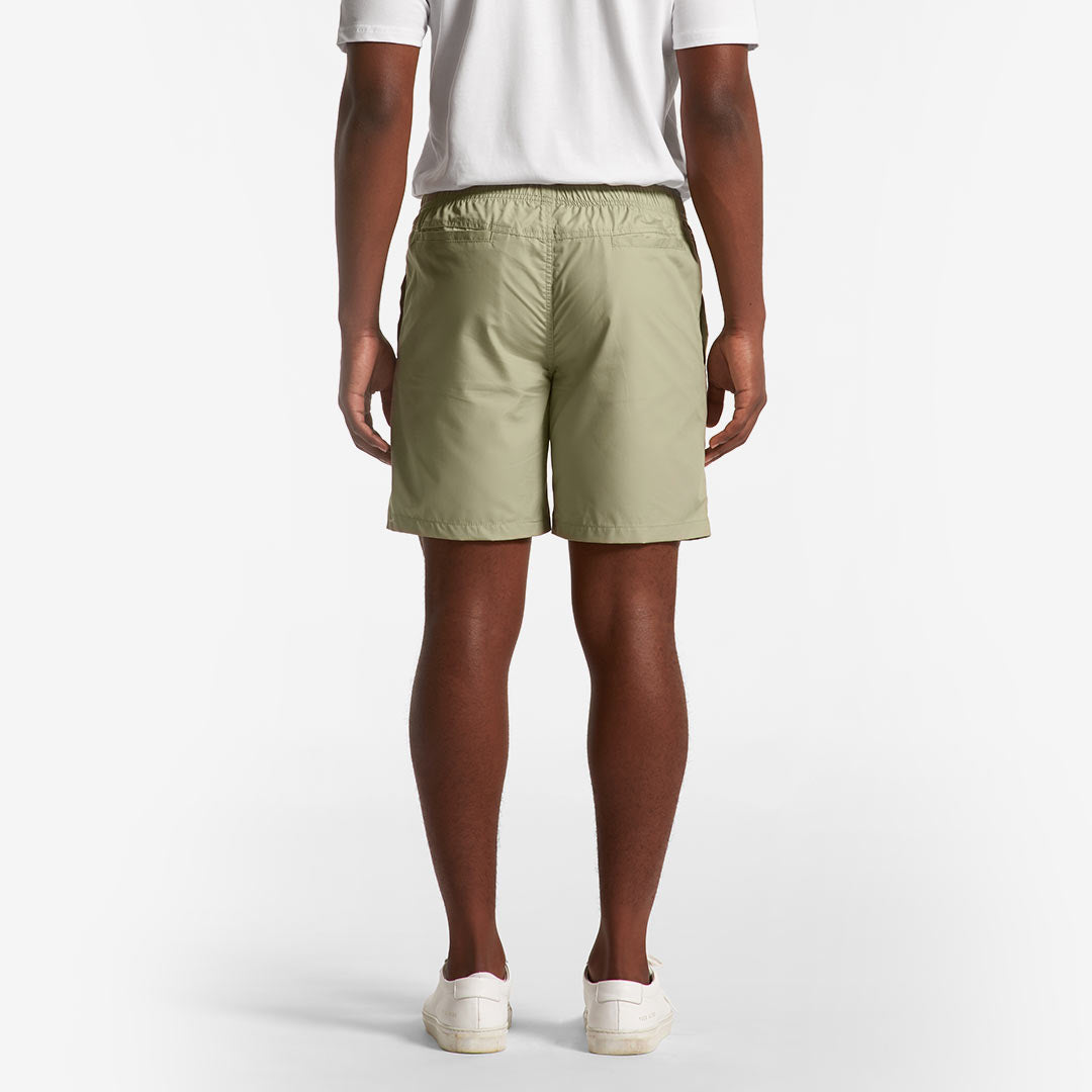 Man wearing AS Colour Men's Beach Shorts in Pistachio Back - 5903