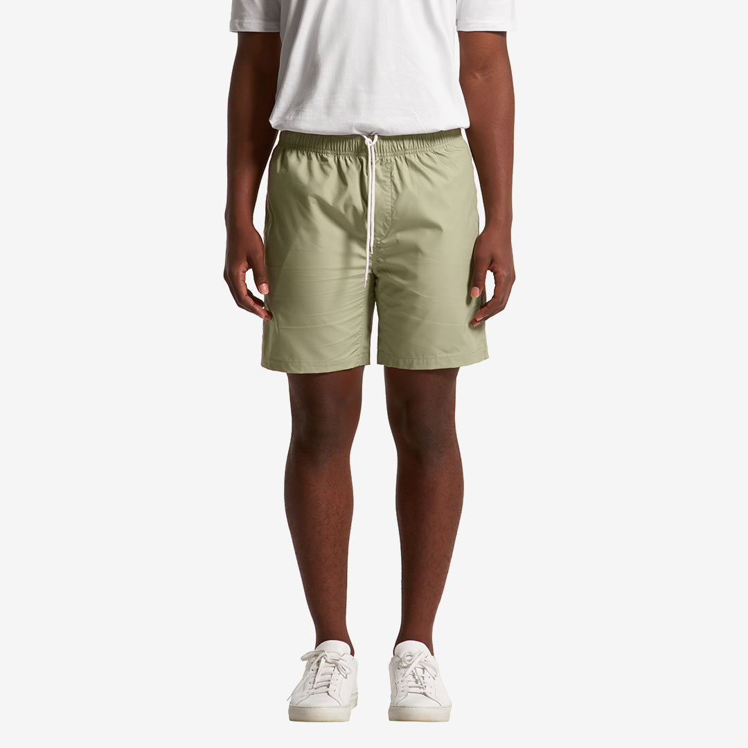 Man wearing AS Colour Men's Beach Shorts in Pistachio Front - 5903