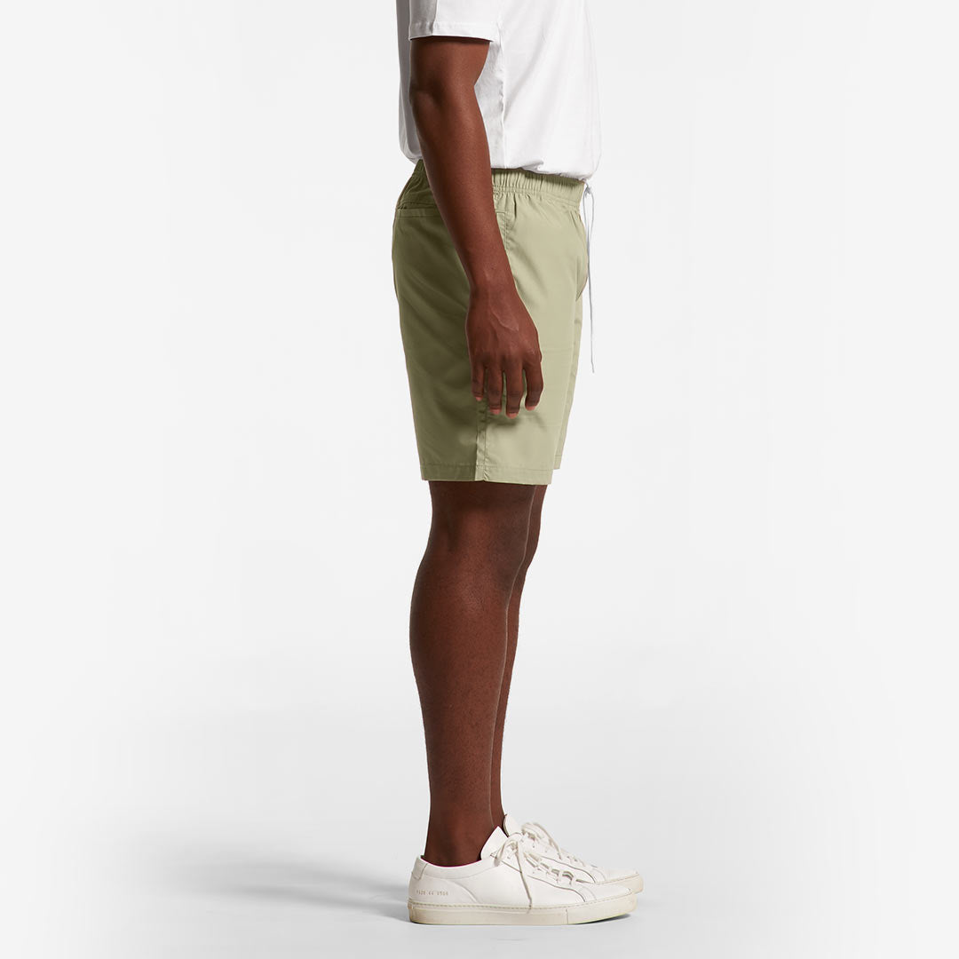 Man wearing AS Colour Men's Beach Shorts in Pistachio Turn - 5903