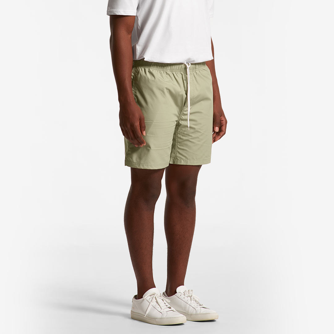 Man wearing AS Colour Men's Beach Shorts in Pistachio Side - 5903
