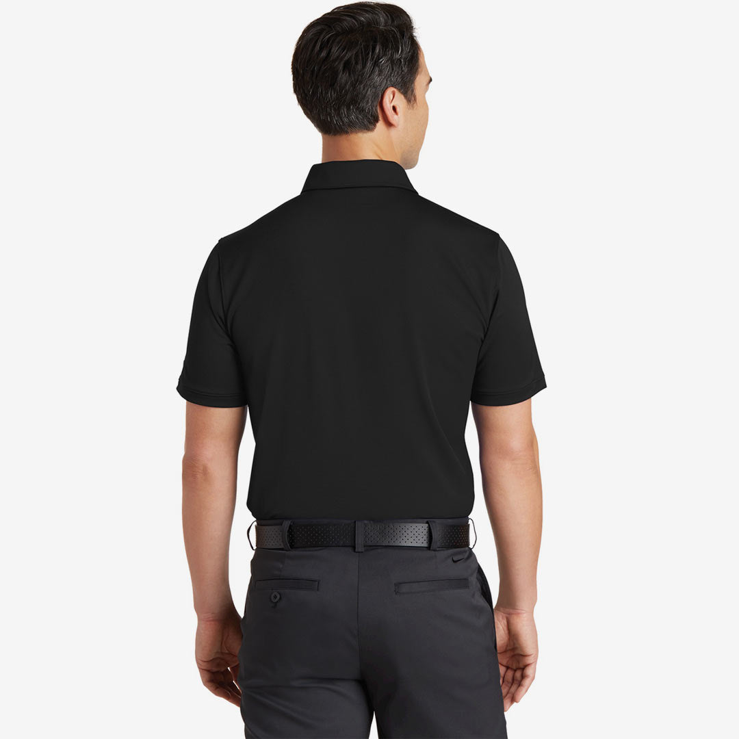 Man wearing Nike Men's Dri-FIT Solid Icon Pique Modern Fit Polo in Black Back - 746099
