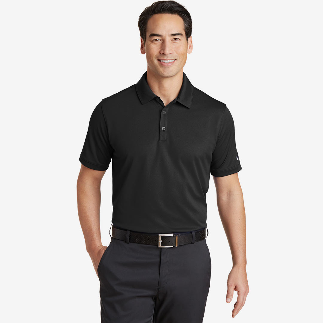 Man wearing Nike Men's Dri-FIT Solid Icon Pique Modern Fit Polo in Black Front - 746099